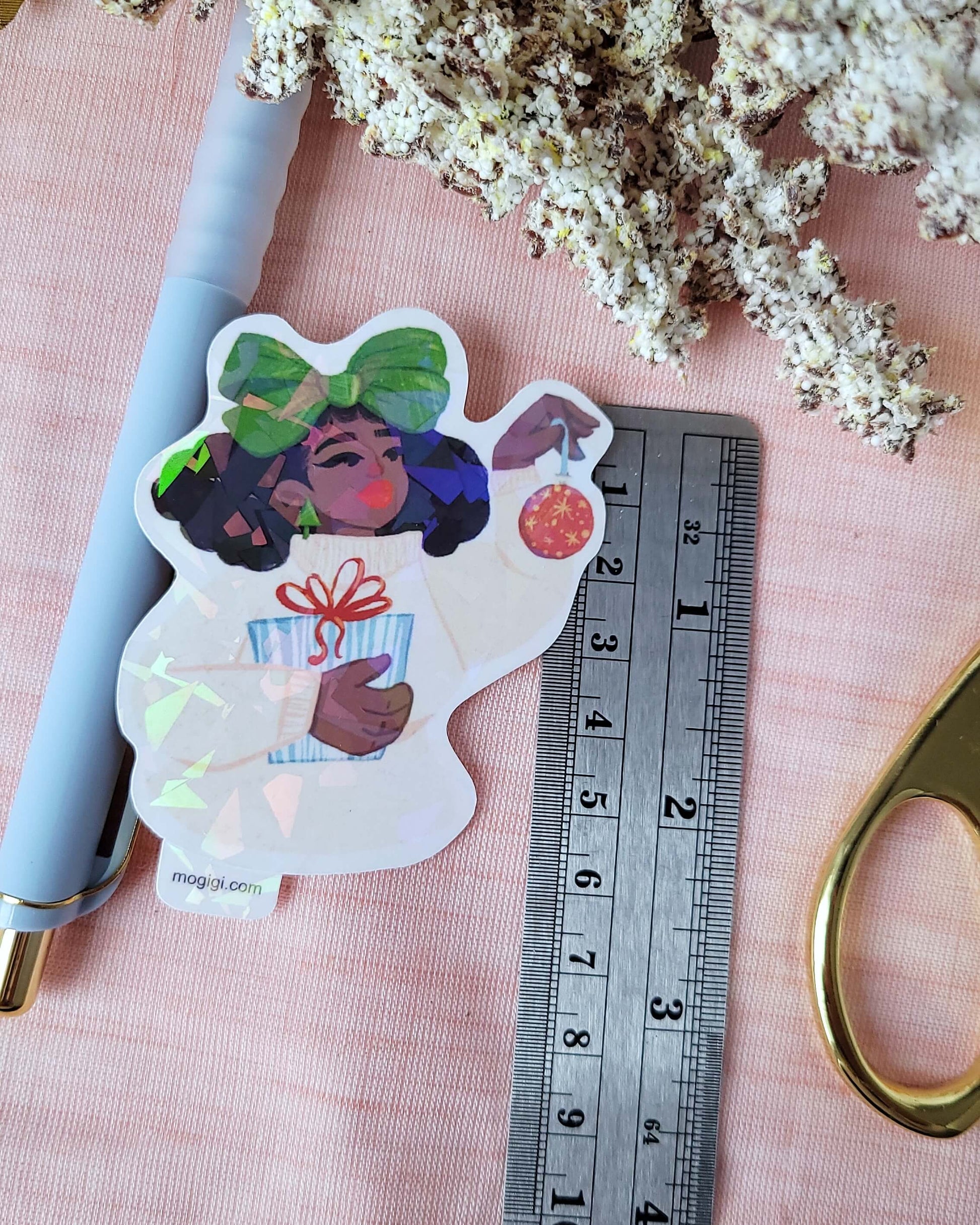 Christmas Bow Girl exclusive limited edition MoGigi™ & Elyse Mountains Ski Lodge sticker collaboration. created by Virginia based illustrator and designer Gigi Moore