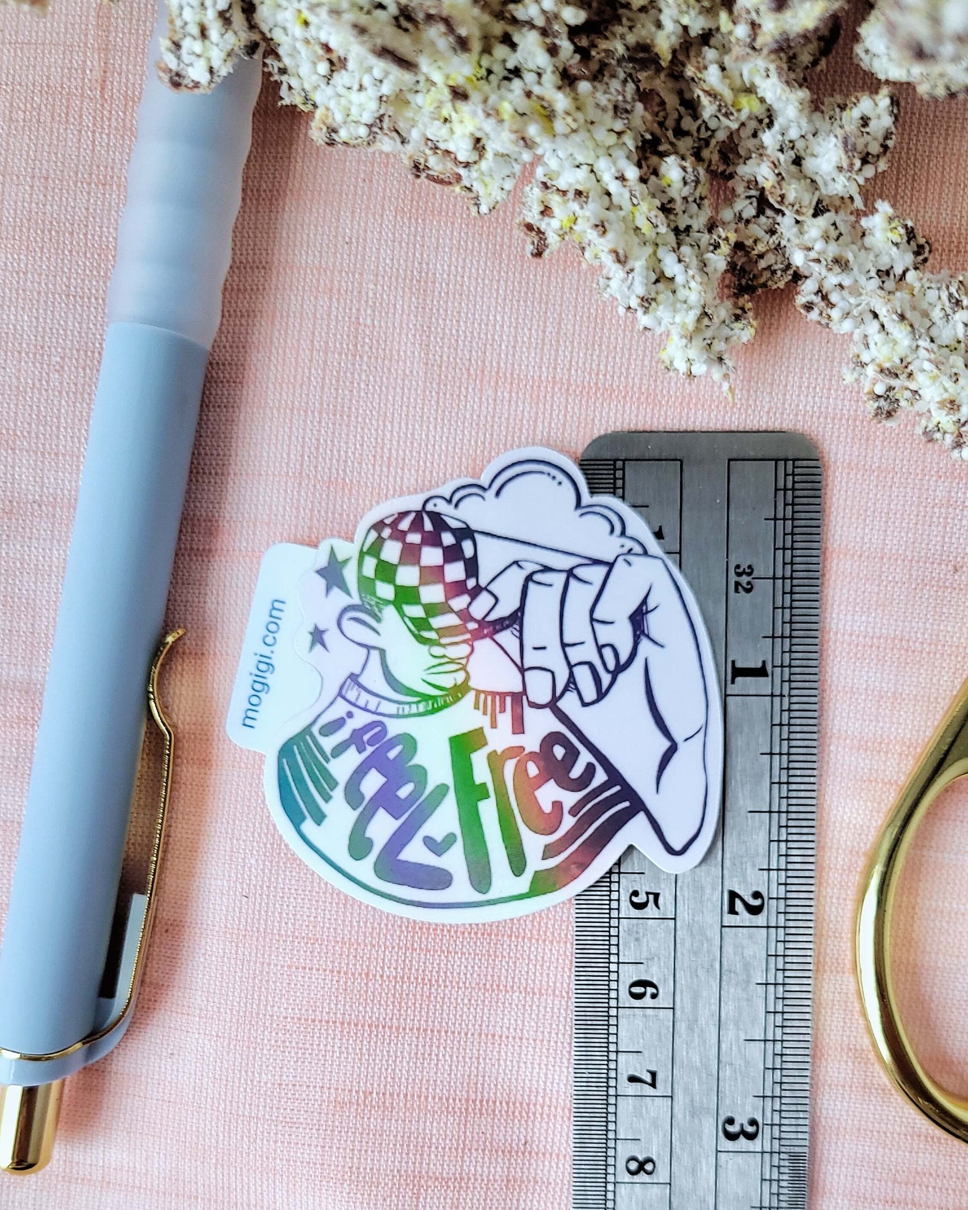 i feel free holographic sticker sticker is a perfect accessory for expressing individuality and a sense of liberation, illustration, art by Gigi Moore, owner of mogigi based in Virginia, shopify art shop, art for black men, art by black artists, black woman owned business, handmade custom unique, cool vinyl waterproof stickers for planners, notebooks, water bottle, laptop, phone cases, hydro flask, and more